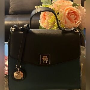 Dune brand mines navy blue and black patent leather handbag